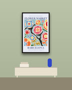 Flower Market Barcelona en una pared verde con marco negro (imagen ilustrativa)