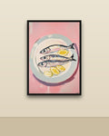 Sardinas con limón en una pared clara con marco negro (imagen ilustrativa)