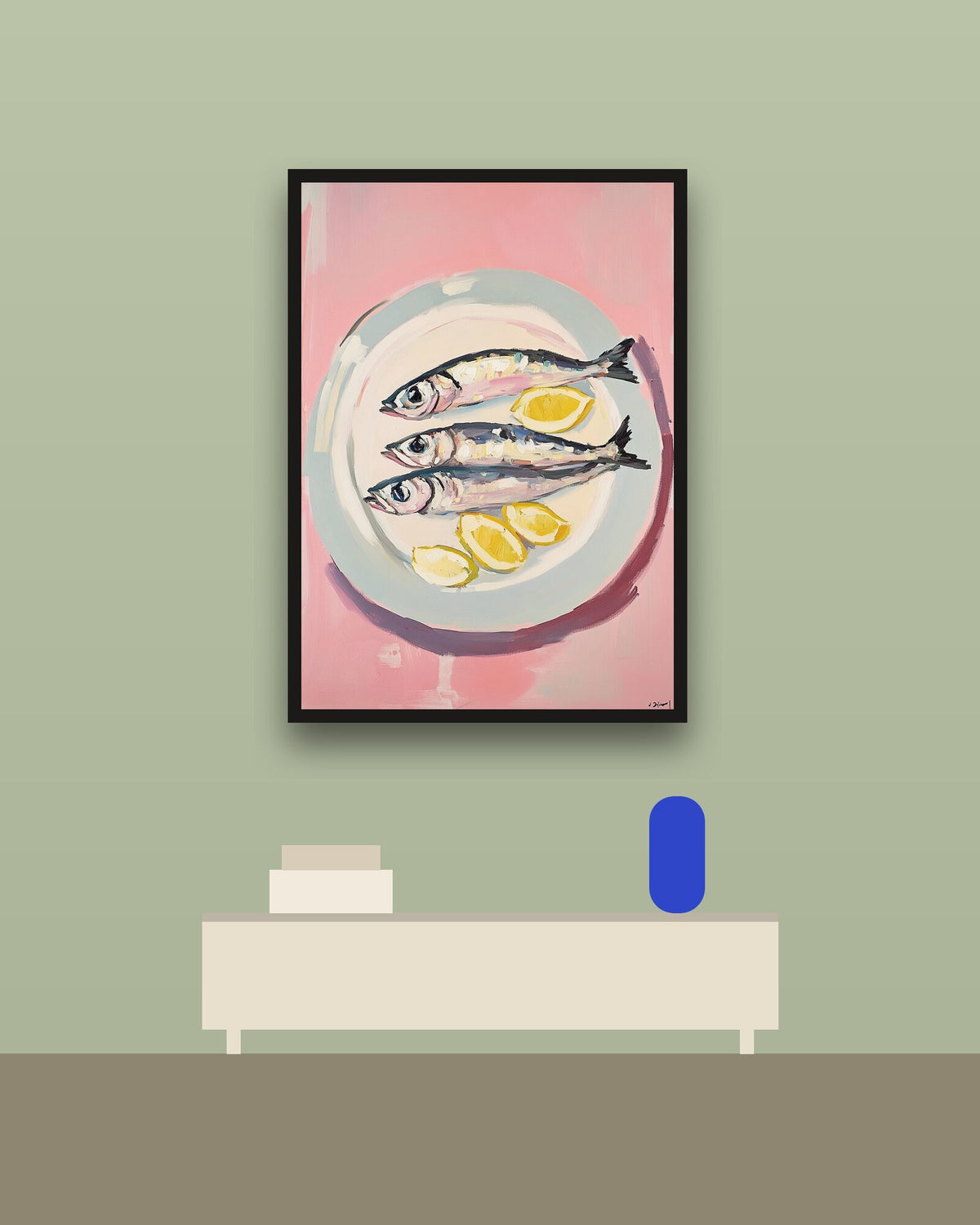 Sardinas con limón en una pared verde con marco negro (imagen ilustrativa)