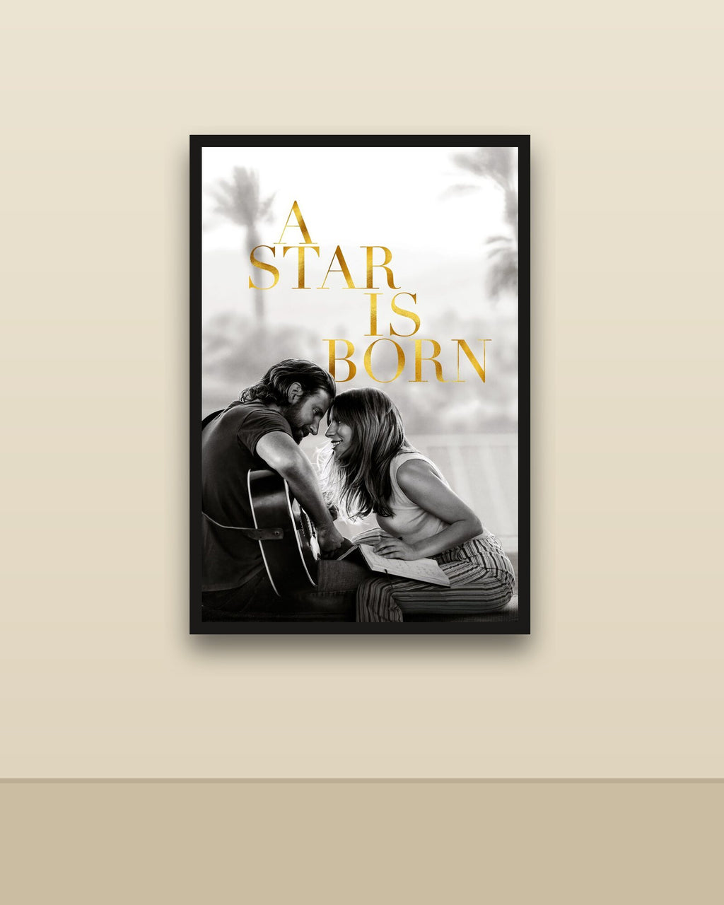 A Star Is Born en una pared clara con marco negro (imagen ilustrativa)
