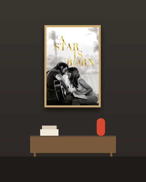 A Star Is Born en una pared oscura con marco de kiri claro (imagen ilustrativa)