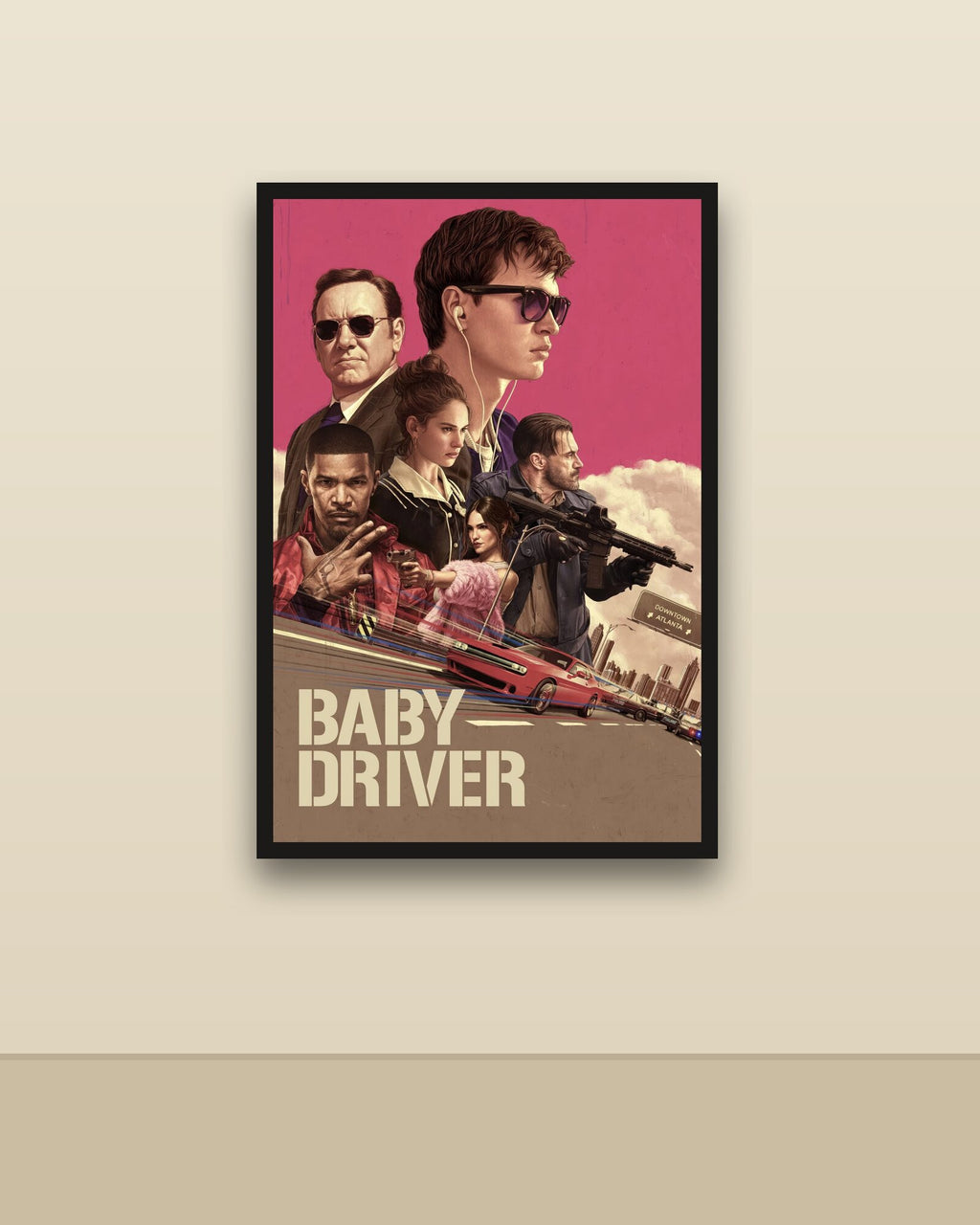 Baby Driver en una pared clara con marco negro (imagen ilustrativa)
