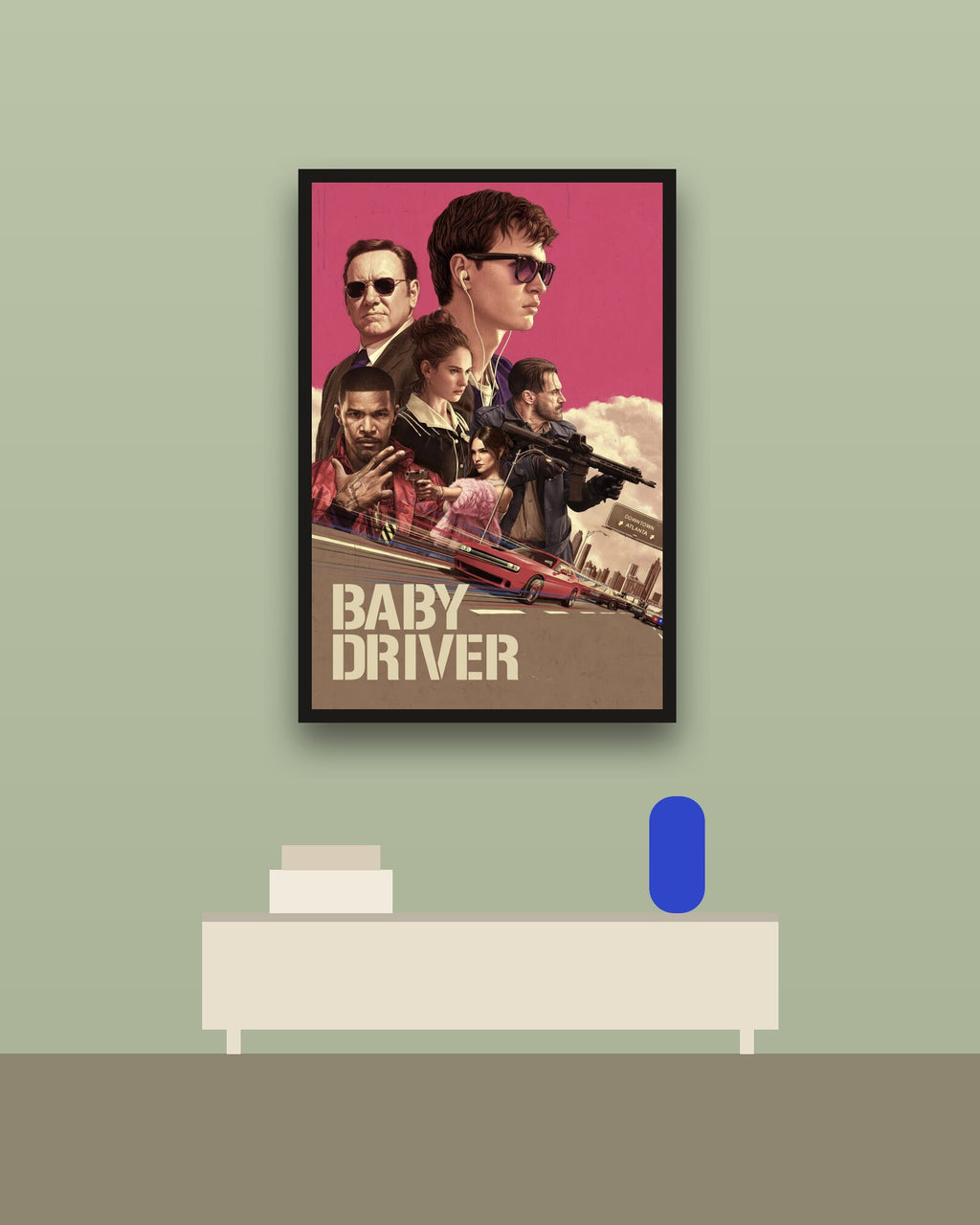 Baby Driver en una pared verde con marco negro (imagen ilustrativa)