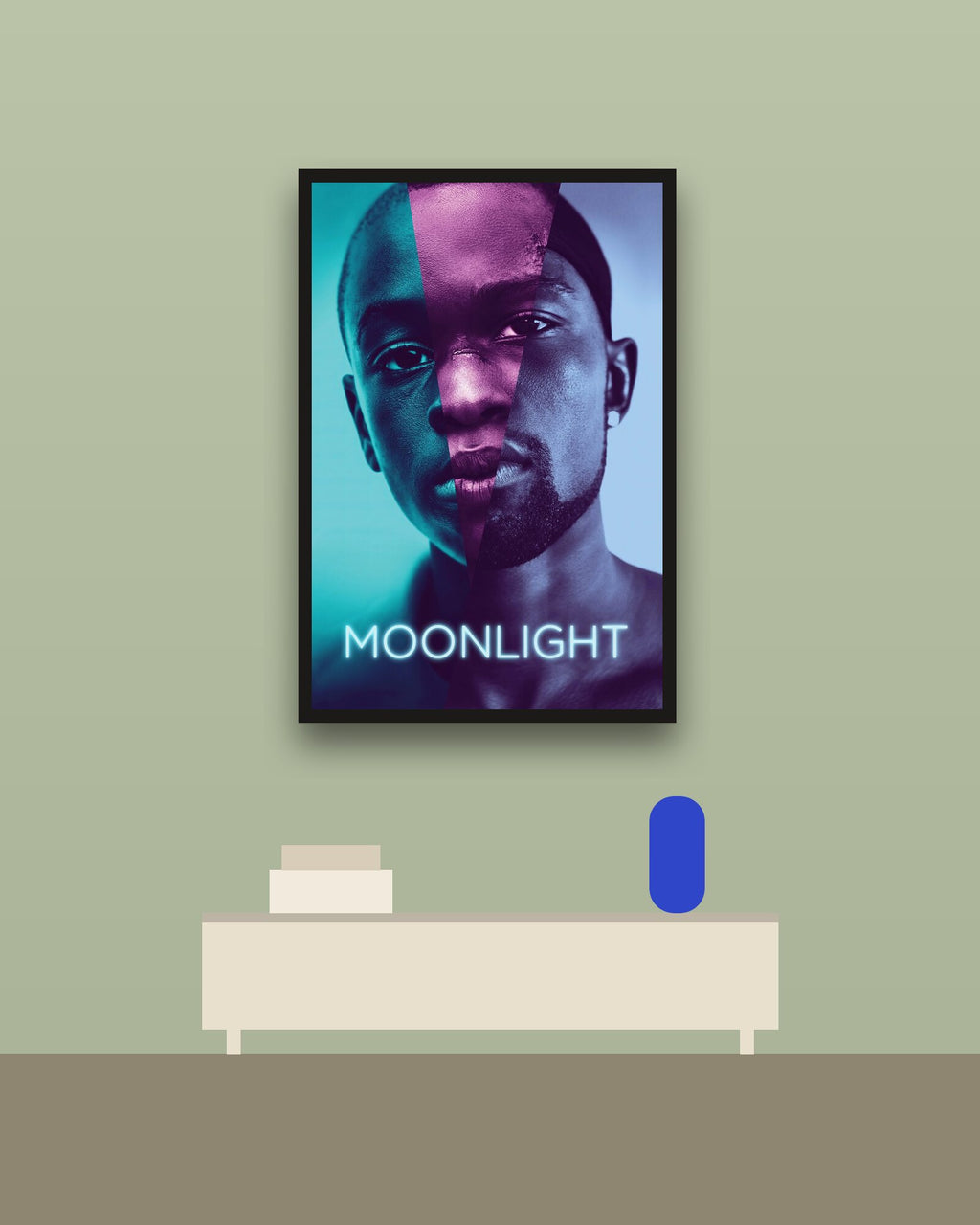 Moonlight en una pared verde con marco negro (imagen ilustrativa)